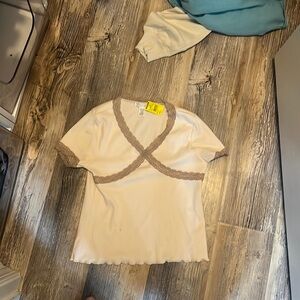 Cute child large pink tee from Tilly’s! never been worn/perfect for tween girl